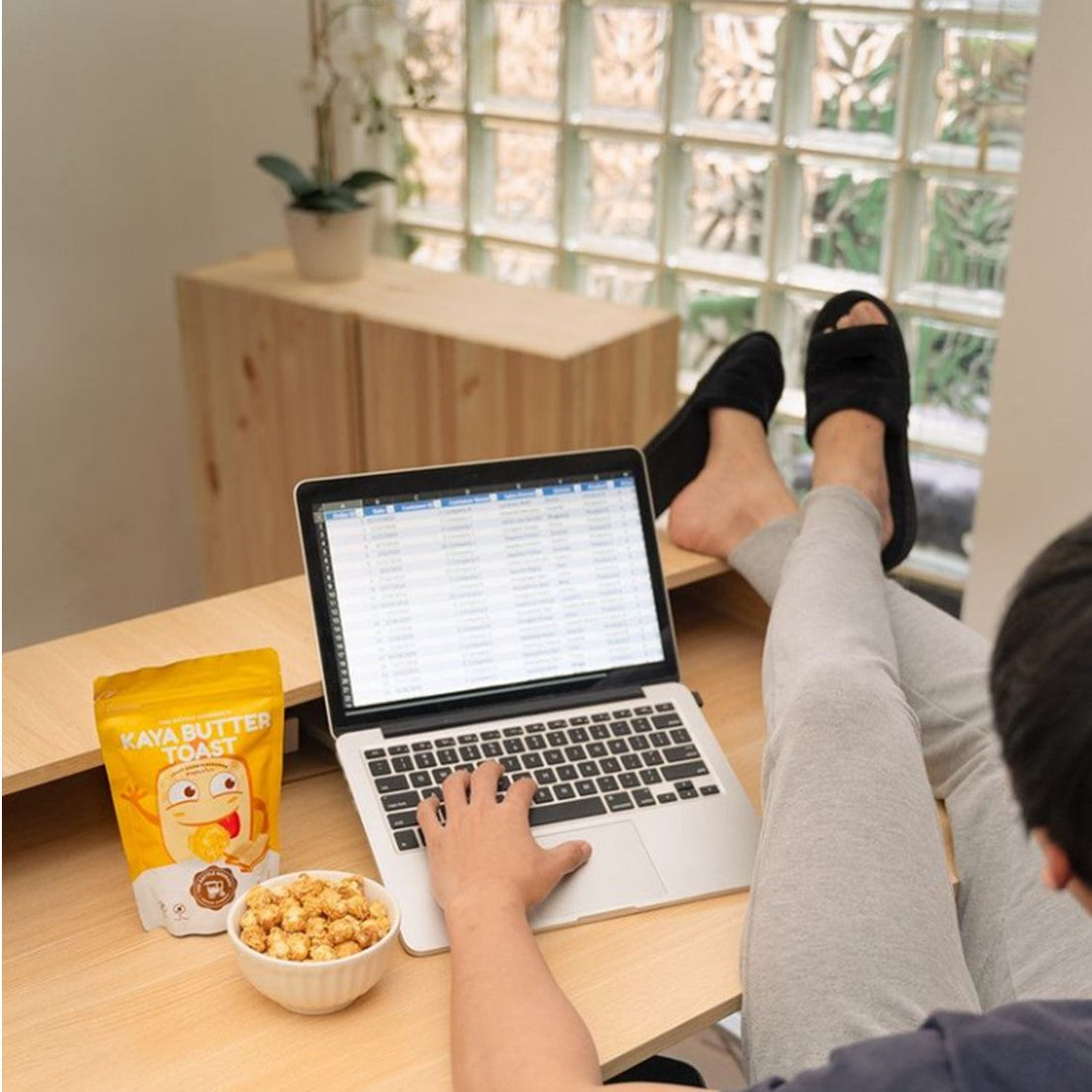 Working from home and snacking on popcorn